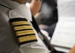 What do the number of stripes on a pilots uniform mean?