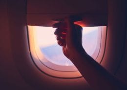 Why do the passenger window blinds need to be open for take-off and landing on a passenger jet